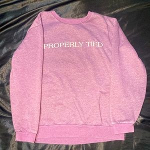 The brand is properly tied it is a small but it would fit a grown woman